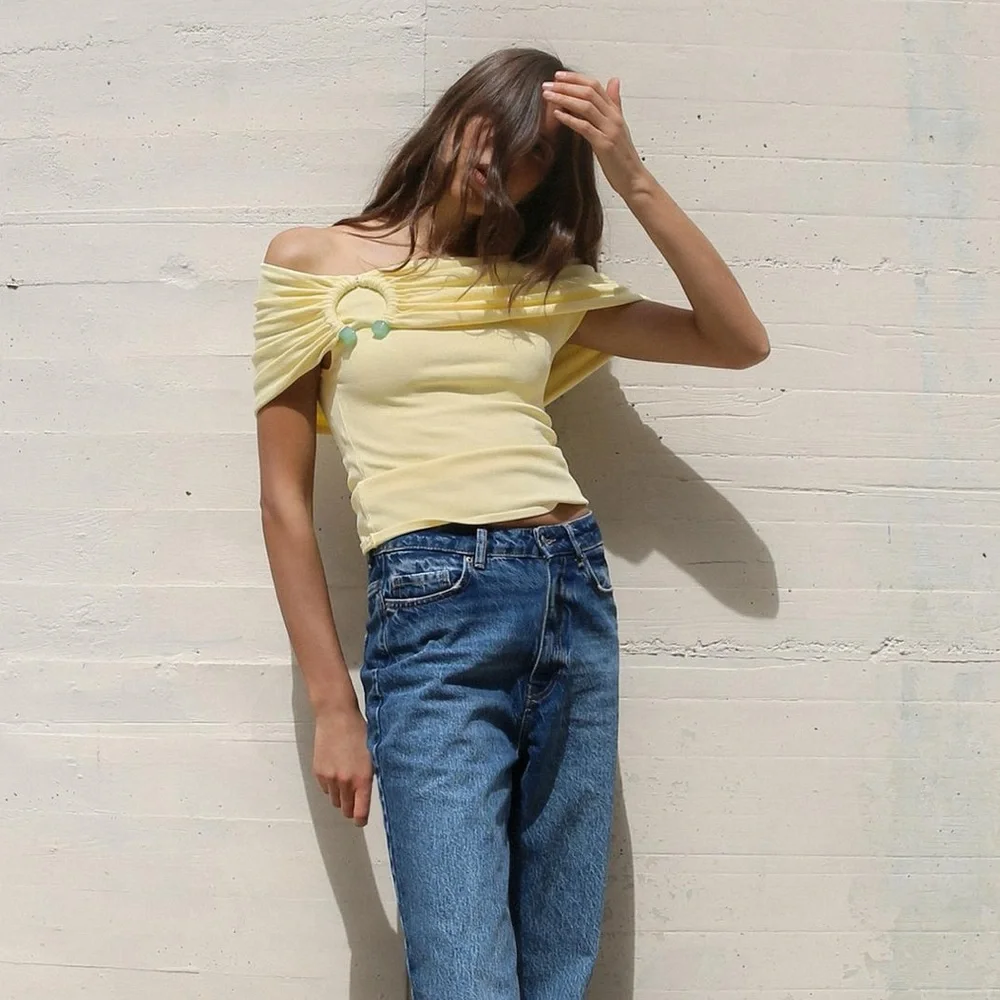 pastel yellow off the shoulder knit top with a blue stone buckle detail - Picture 1 of 4